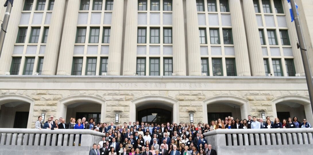 U of I Systems in front of the State of Illinois Library